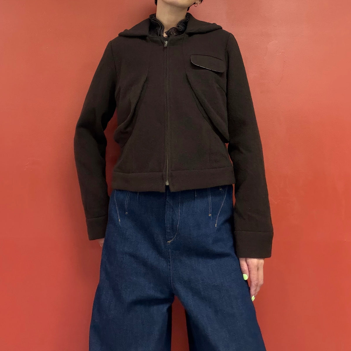 Curved pocket zip jacket
