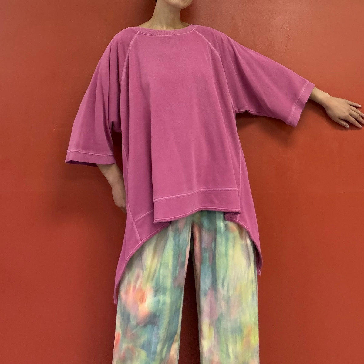 Asymmetrical draped tunic top