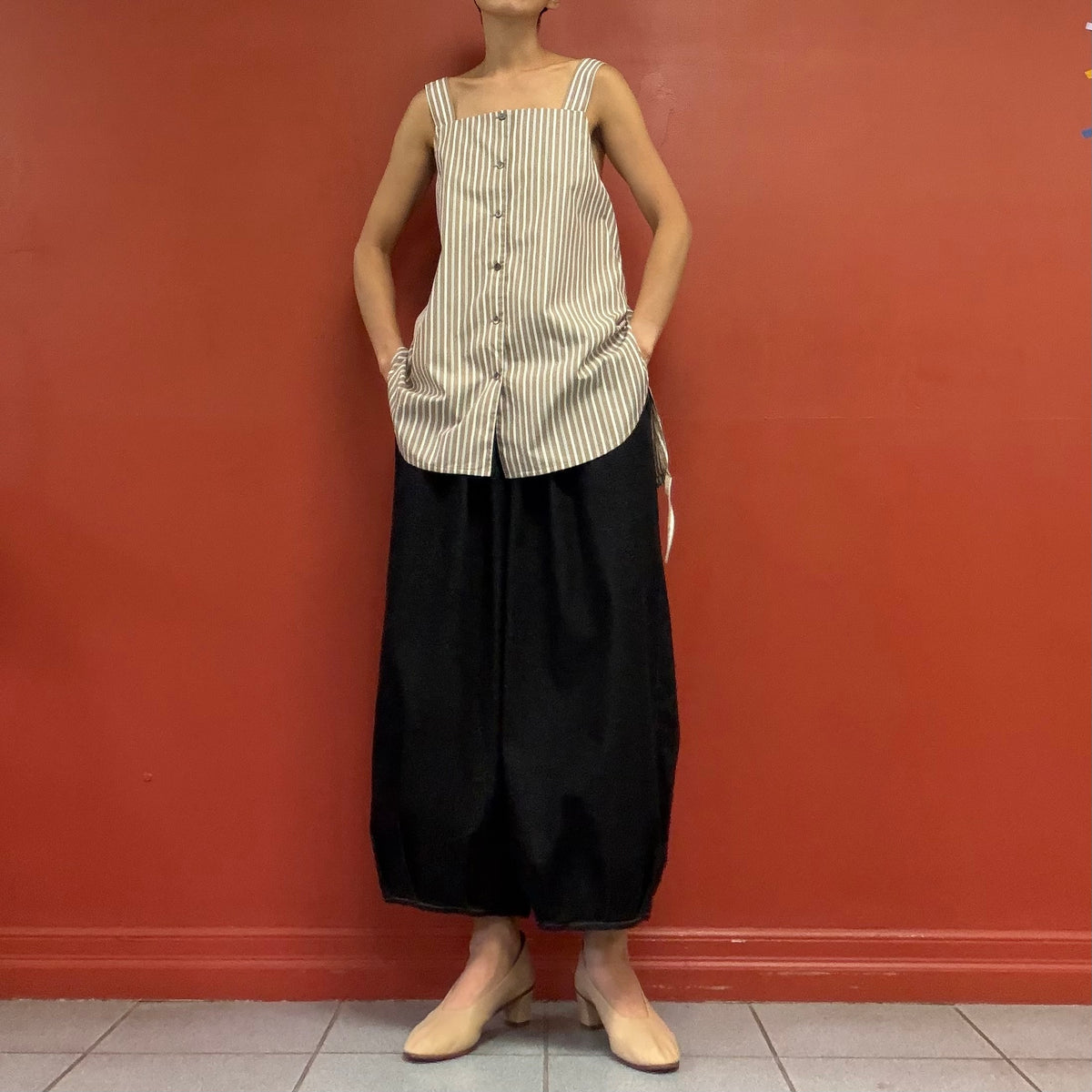 Cross back no sleeves shirt
