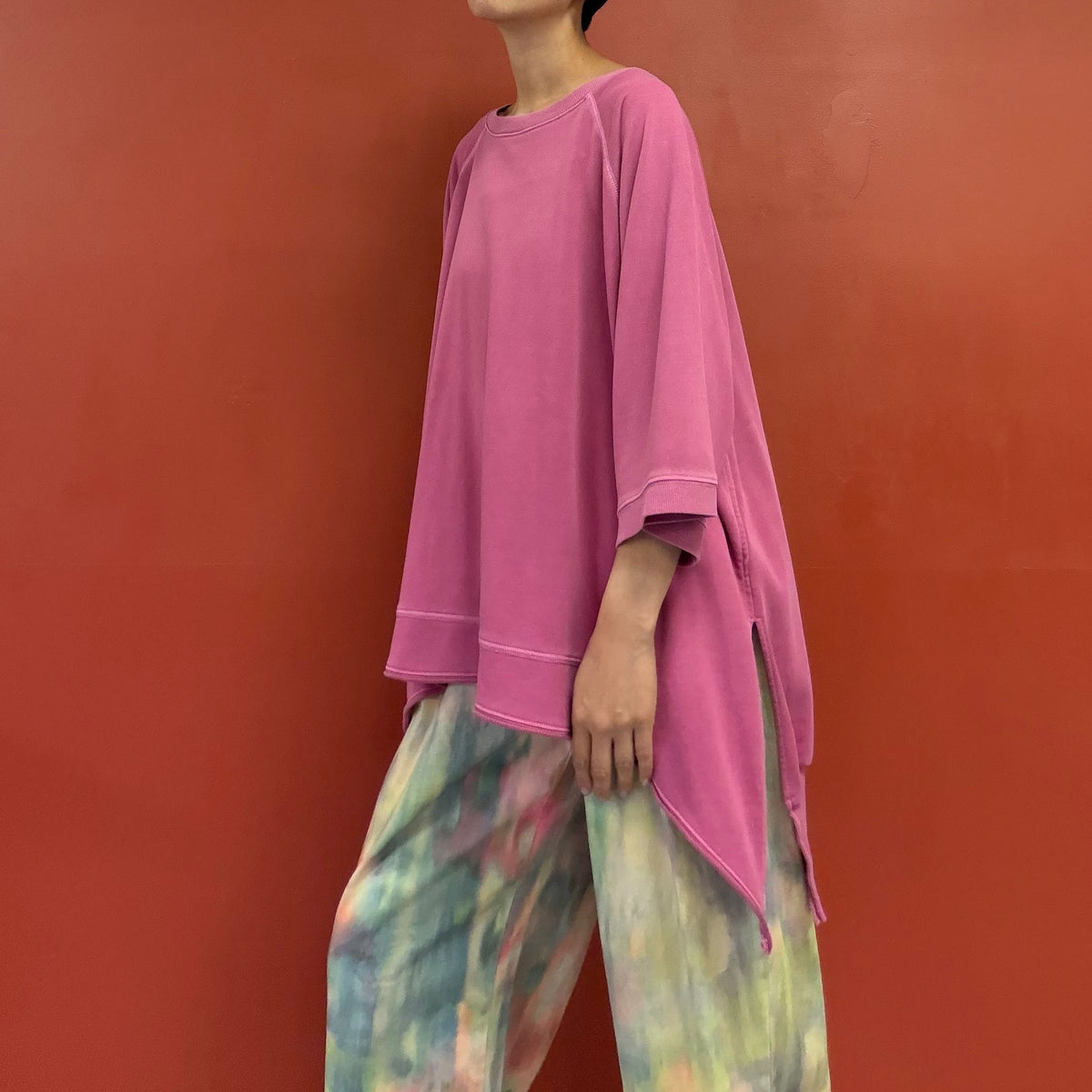 Asymmetrical draped tunic top