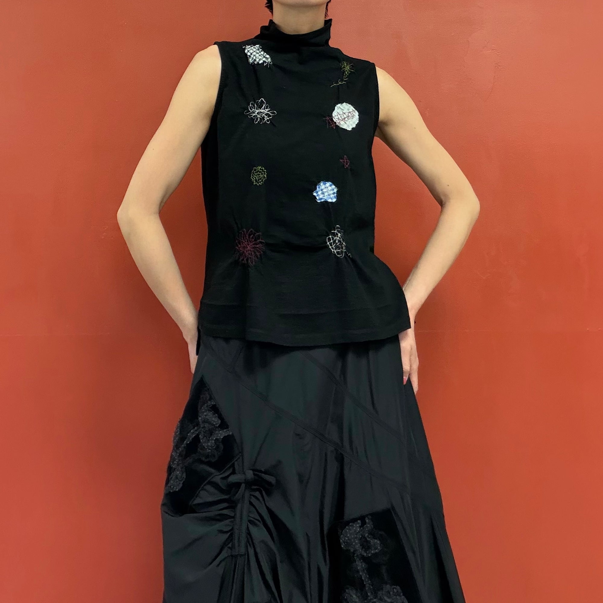 Appliqued no sleeves top