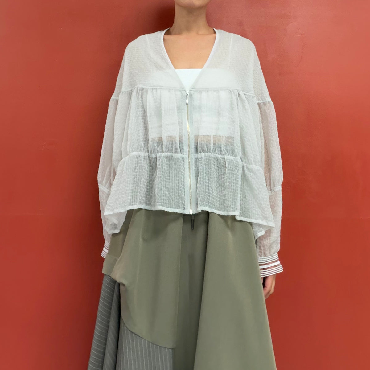 Sheer blouse with puffy sleeves