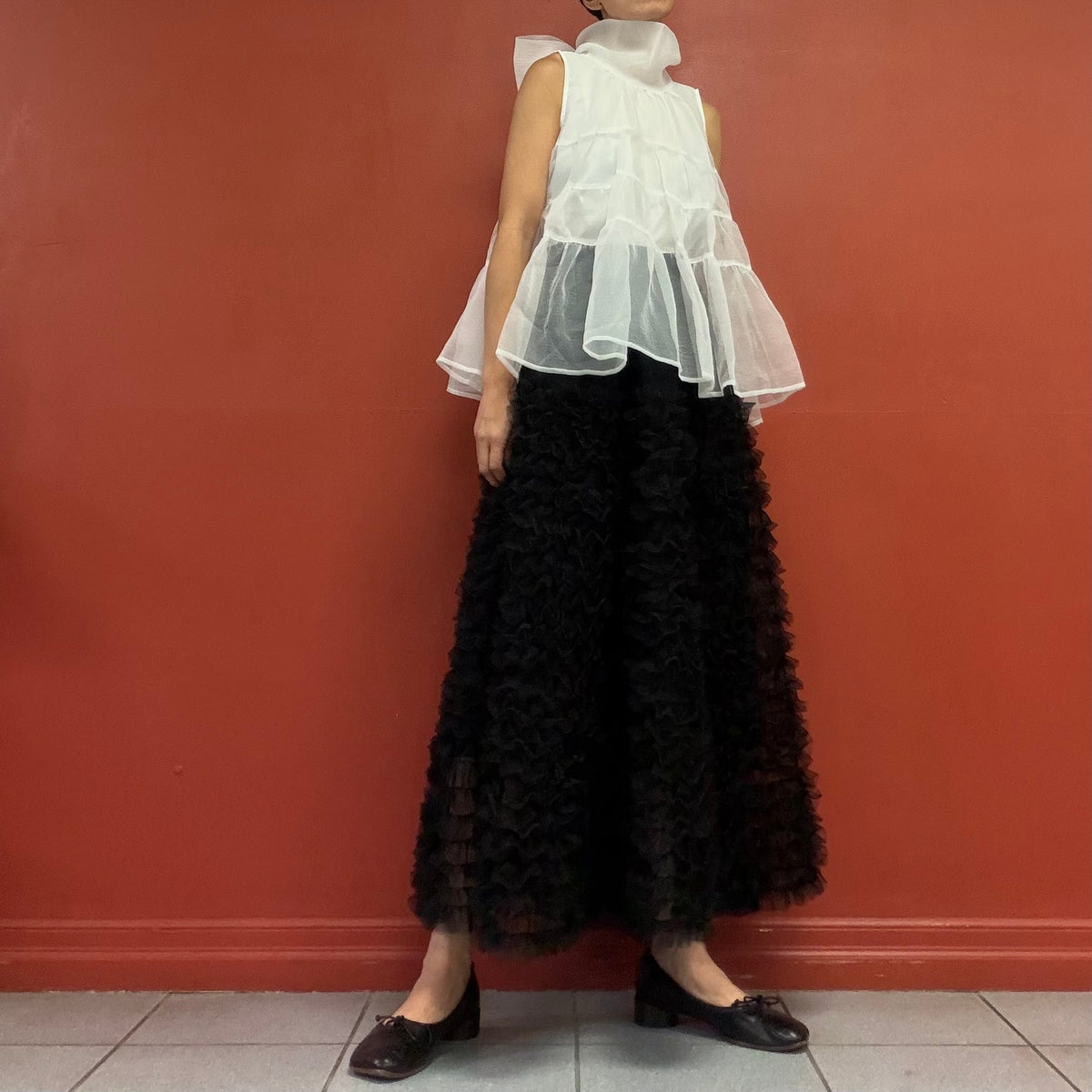 Sheer tiered bow neck top
