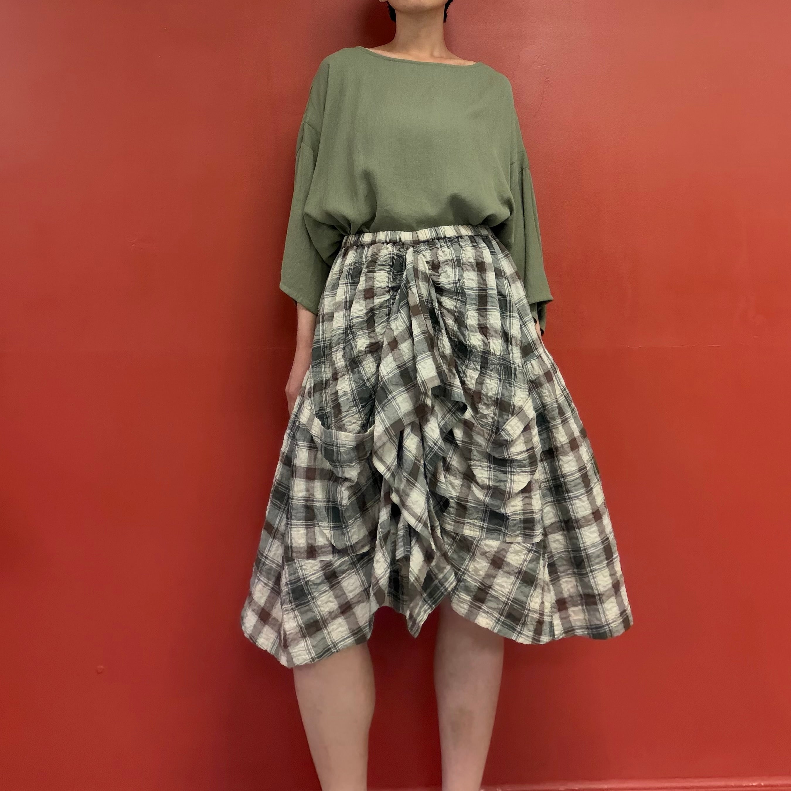 Draped pocket check skirt