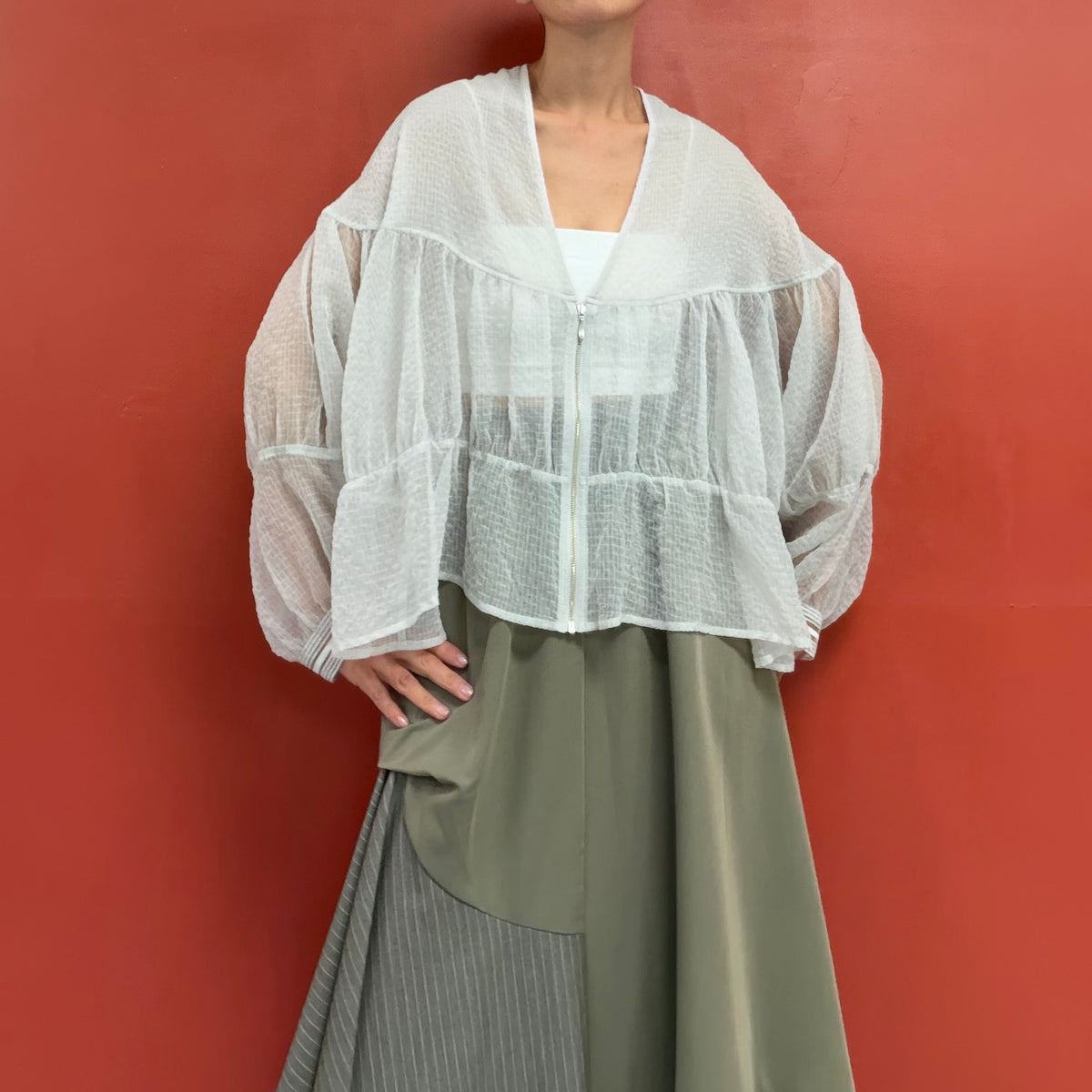 Sheer blouse with puffy sleeves
