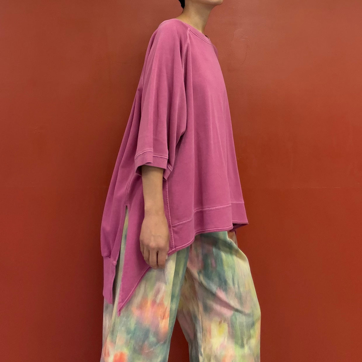 Asymmetrical draped tunic top