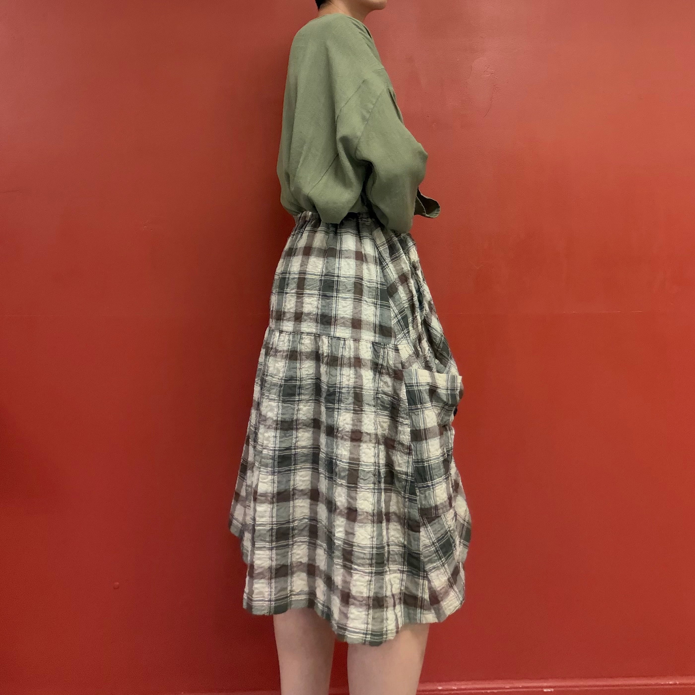 Draped pocket check skirt