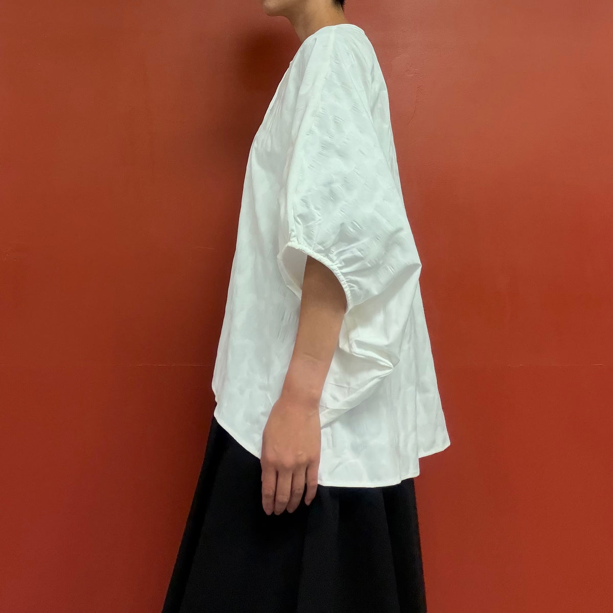 Dolman sleeves blouse with subtle flower texture