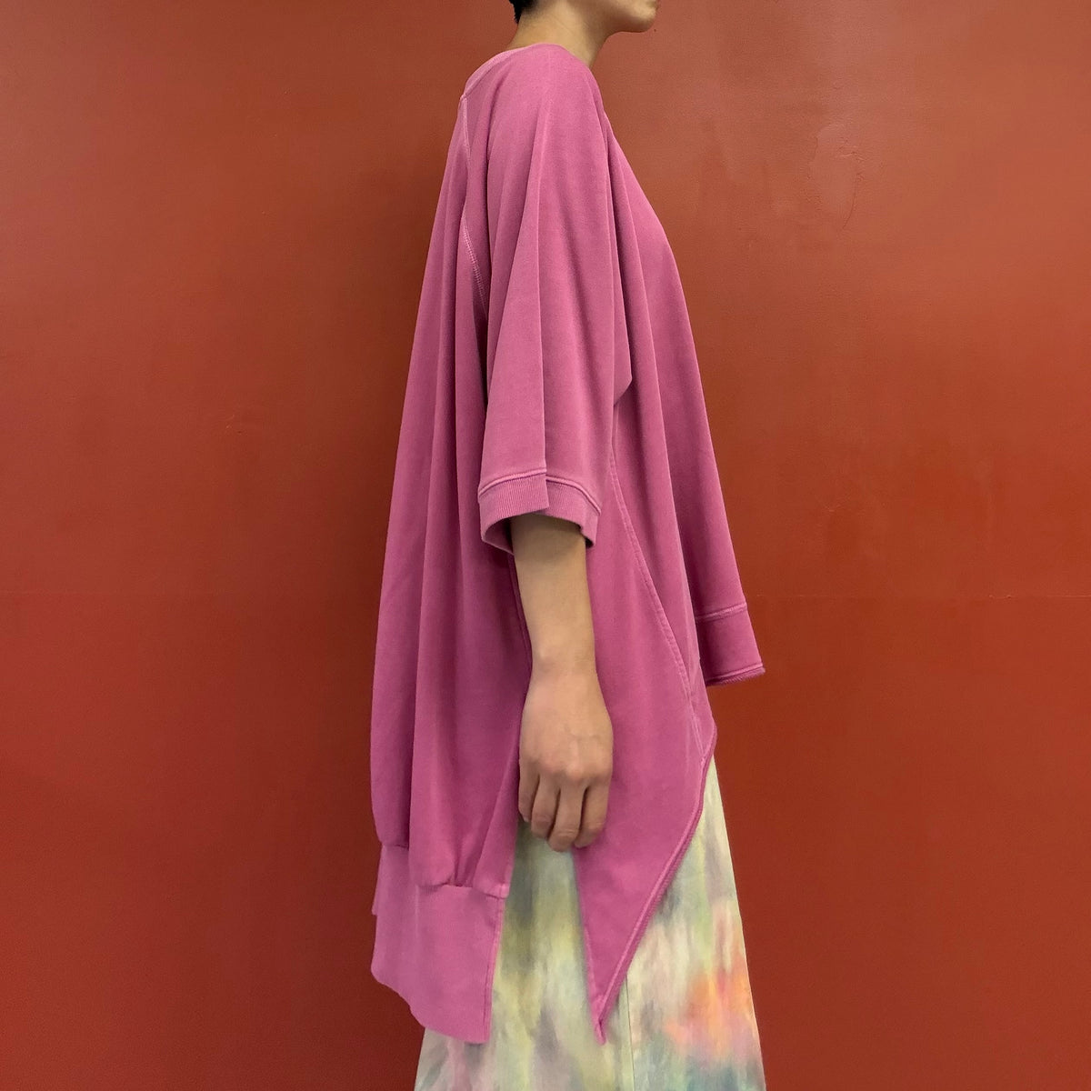 Asymmetrical draped tunic top