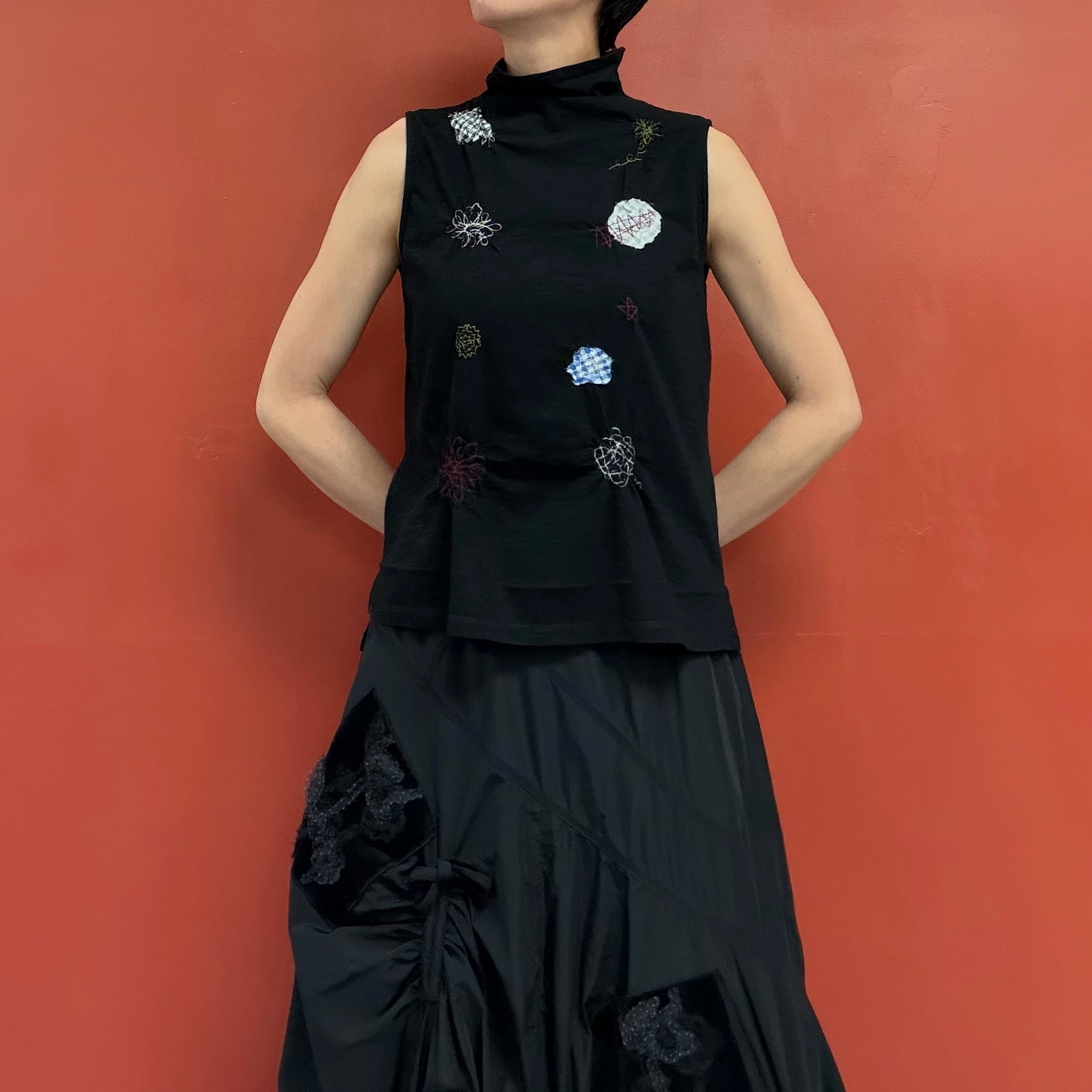 Appliqued no sleeves top