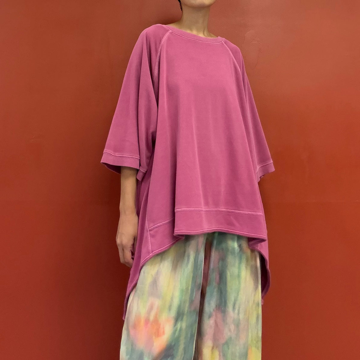 Asymmetrical draped tunic top