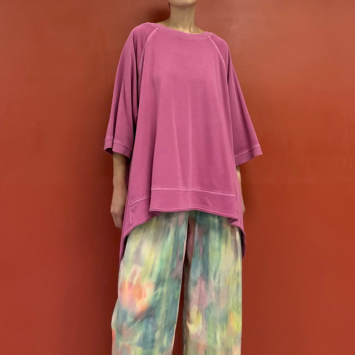 Asymmetrical draped tunic top