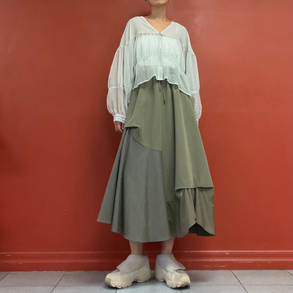 Sheer blouse with puffy sleeves