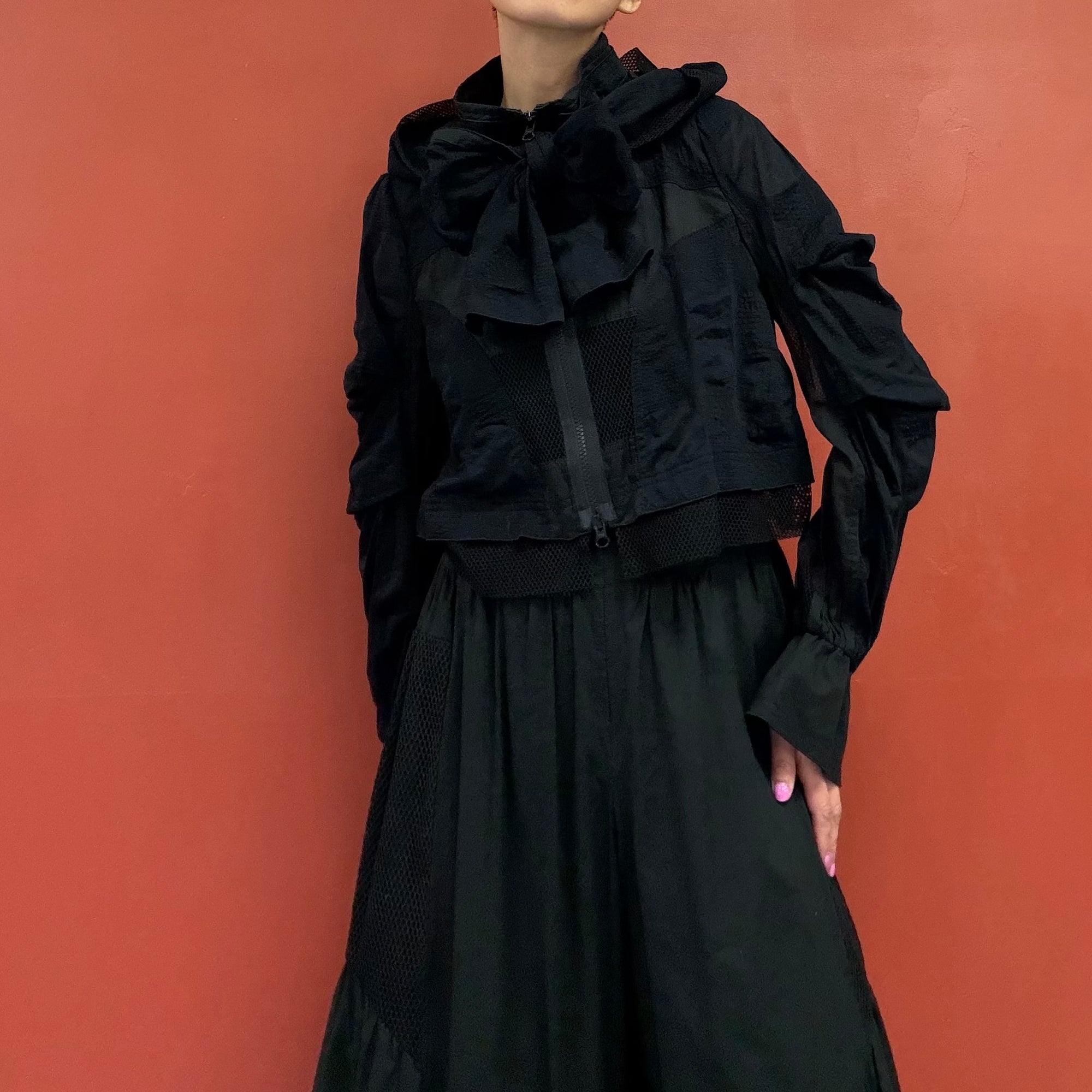 Jacket with a removable hood