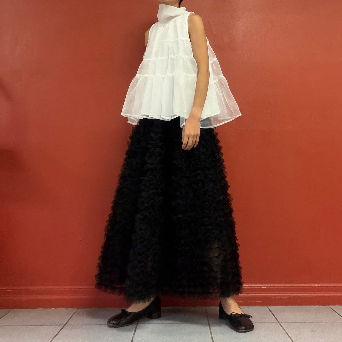 Sheer tiered bow neck top