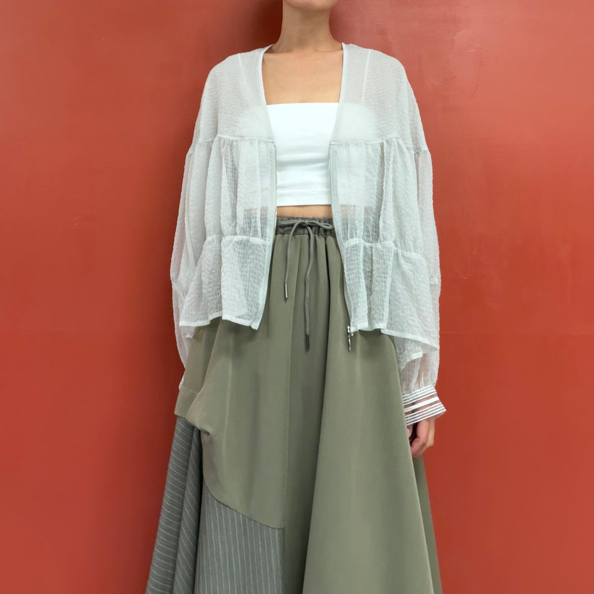 Sheer blouse with puffy sleeves
