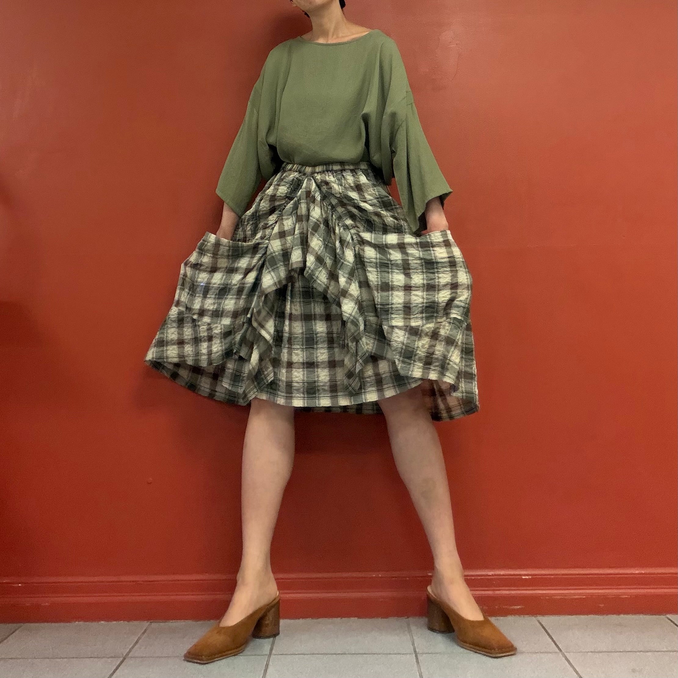 Draped pocket check skirt