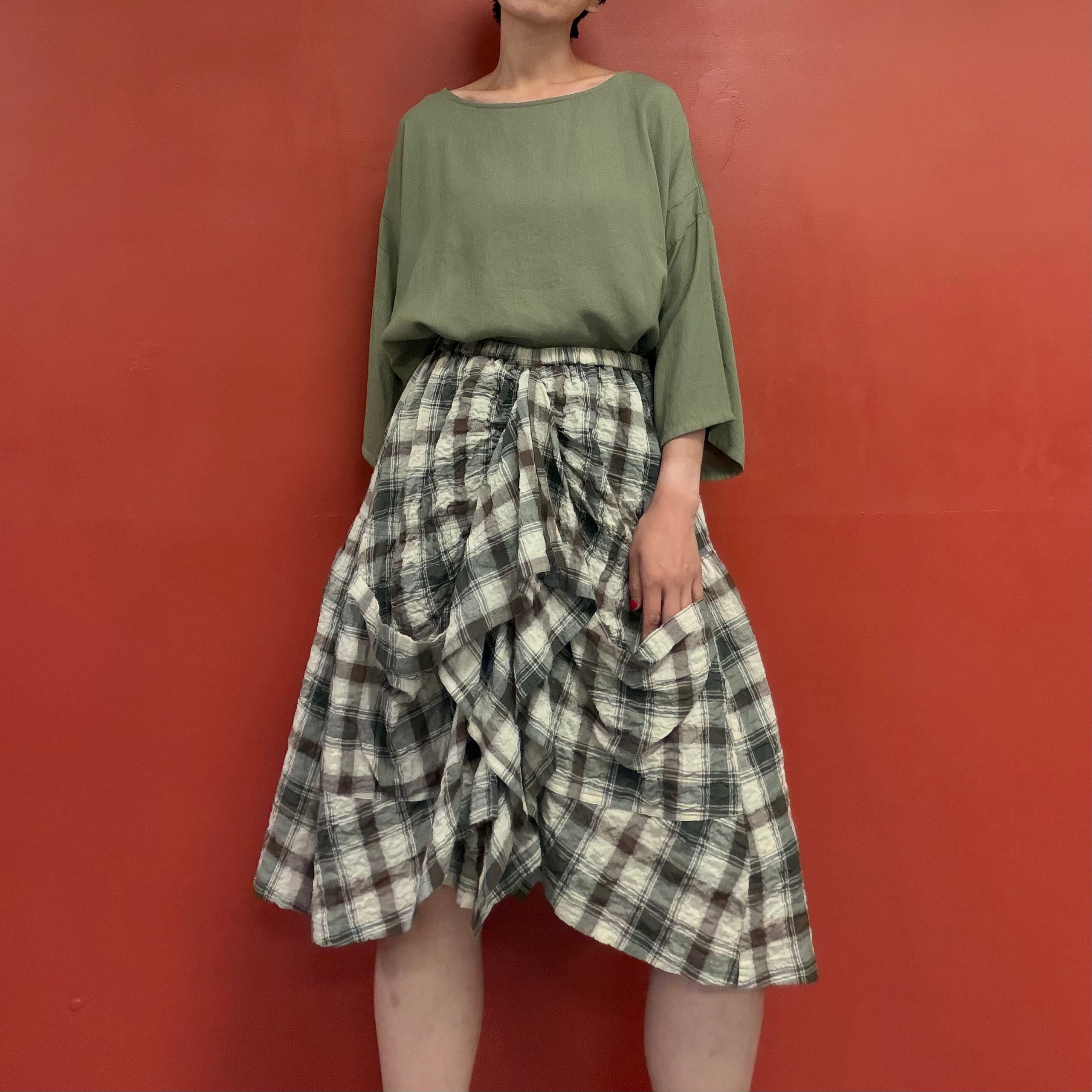 Draped pocket check skirt