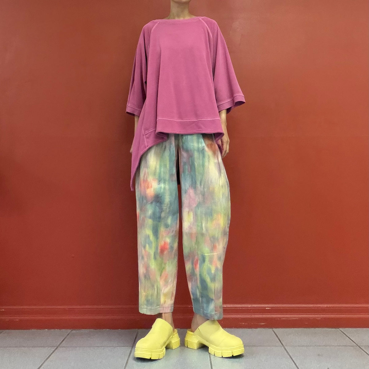 Asymmetrical draped tunic top