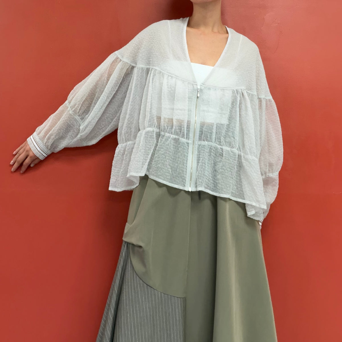 Sheer blouse with puffy sleeves