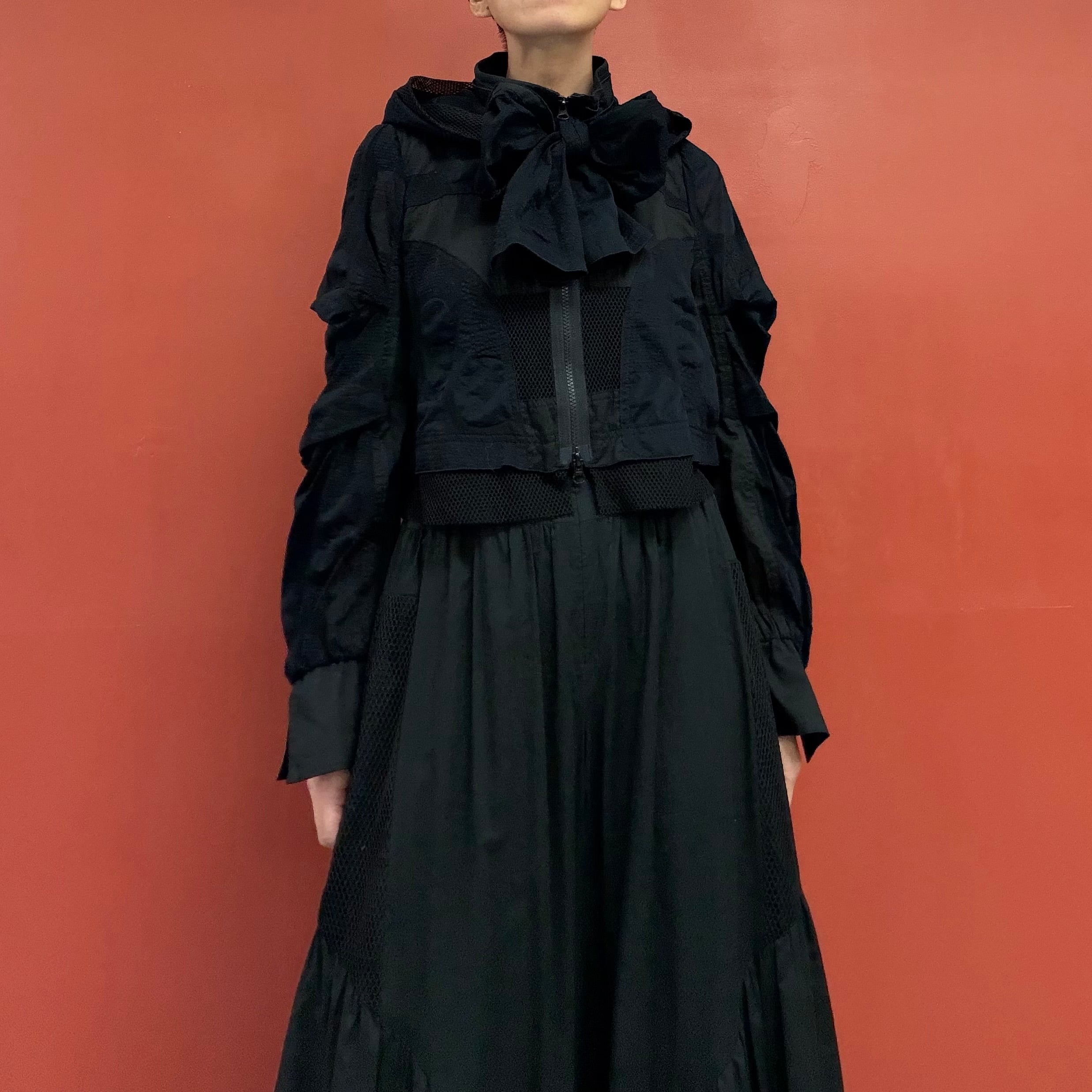 Jacket with a removable hood