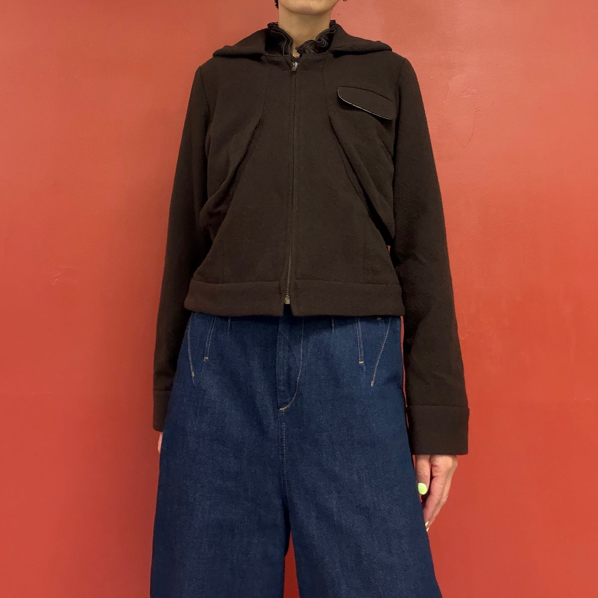 Curved pocket zip jacket