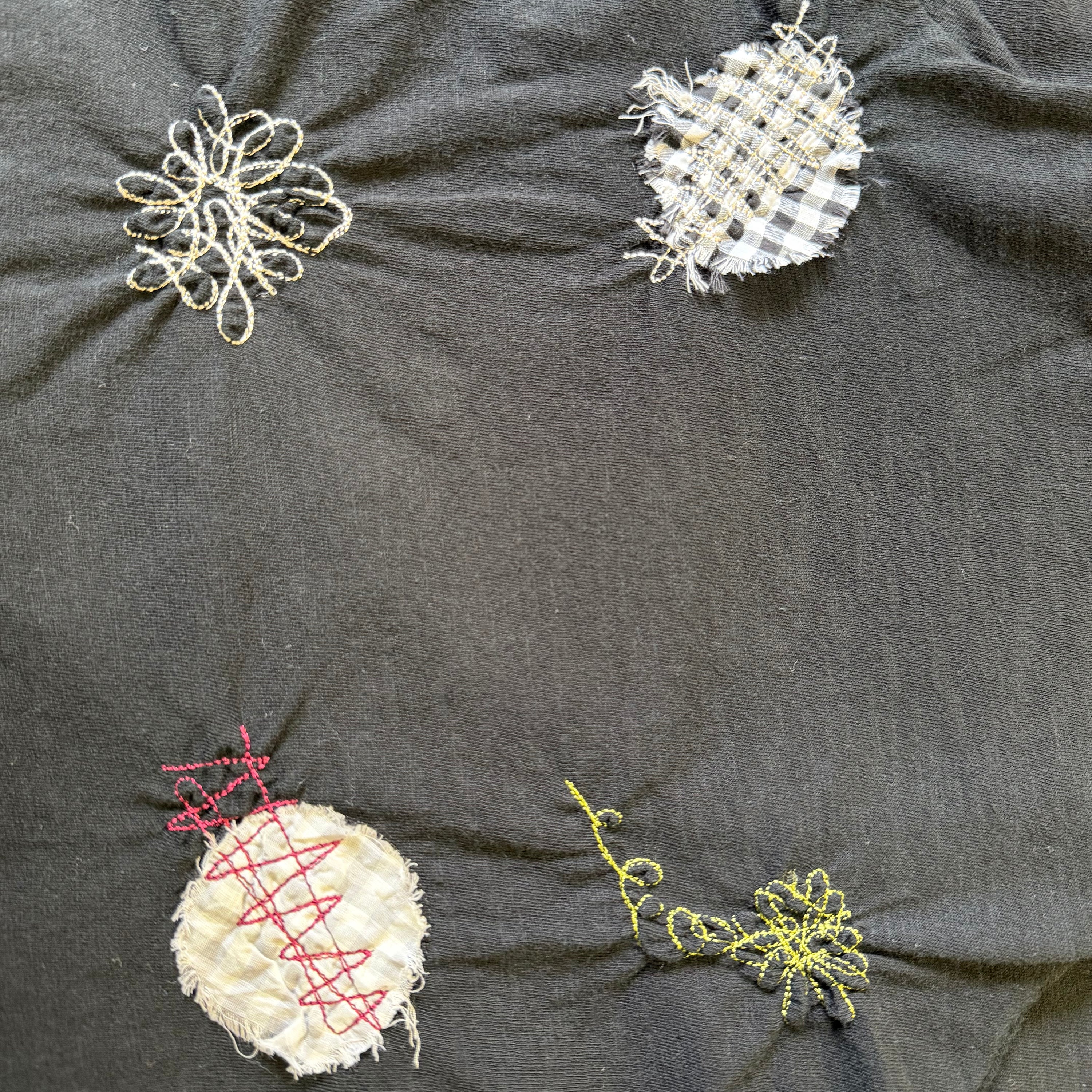 Appliqued no sleeves top
