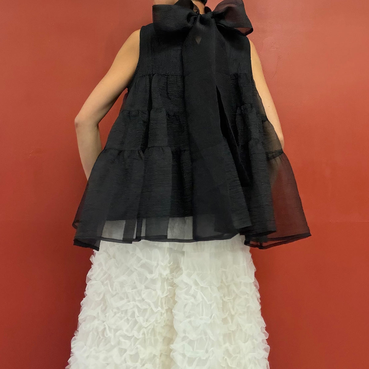 Sheer tiered bow neck top