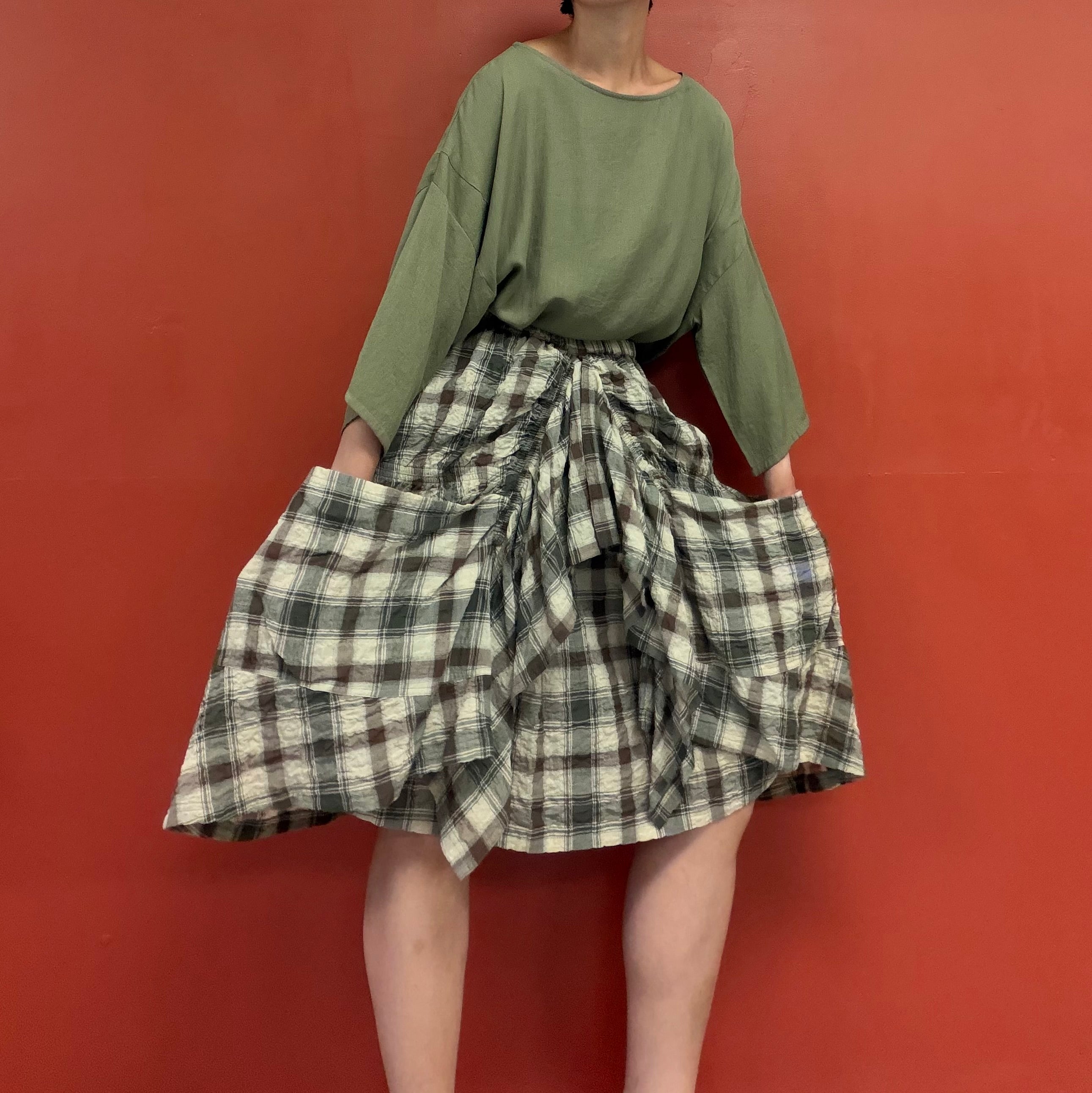Draped pocket check skirt