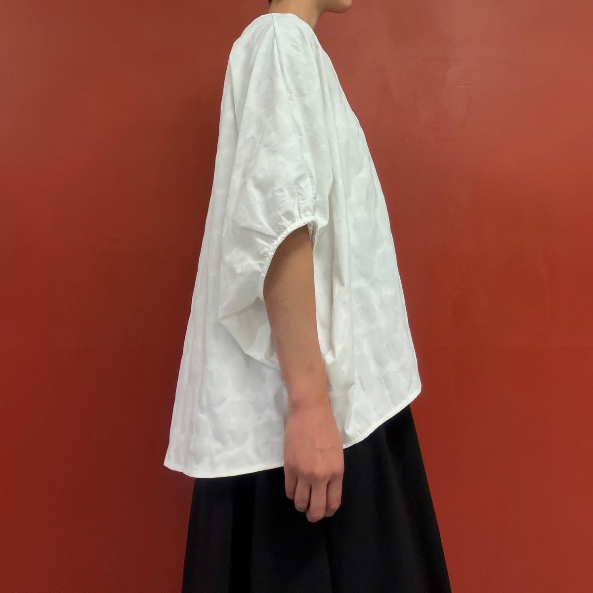 Dolman sleeves blouse with subtle flower texture