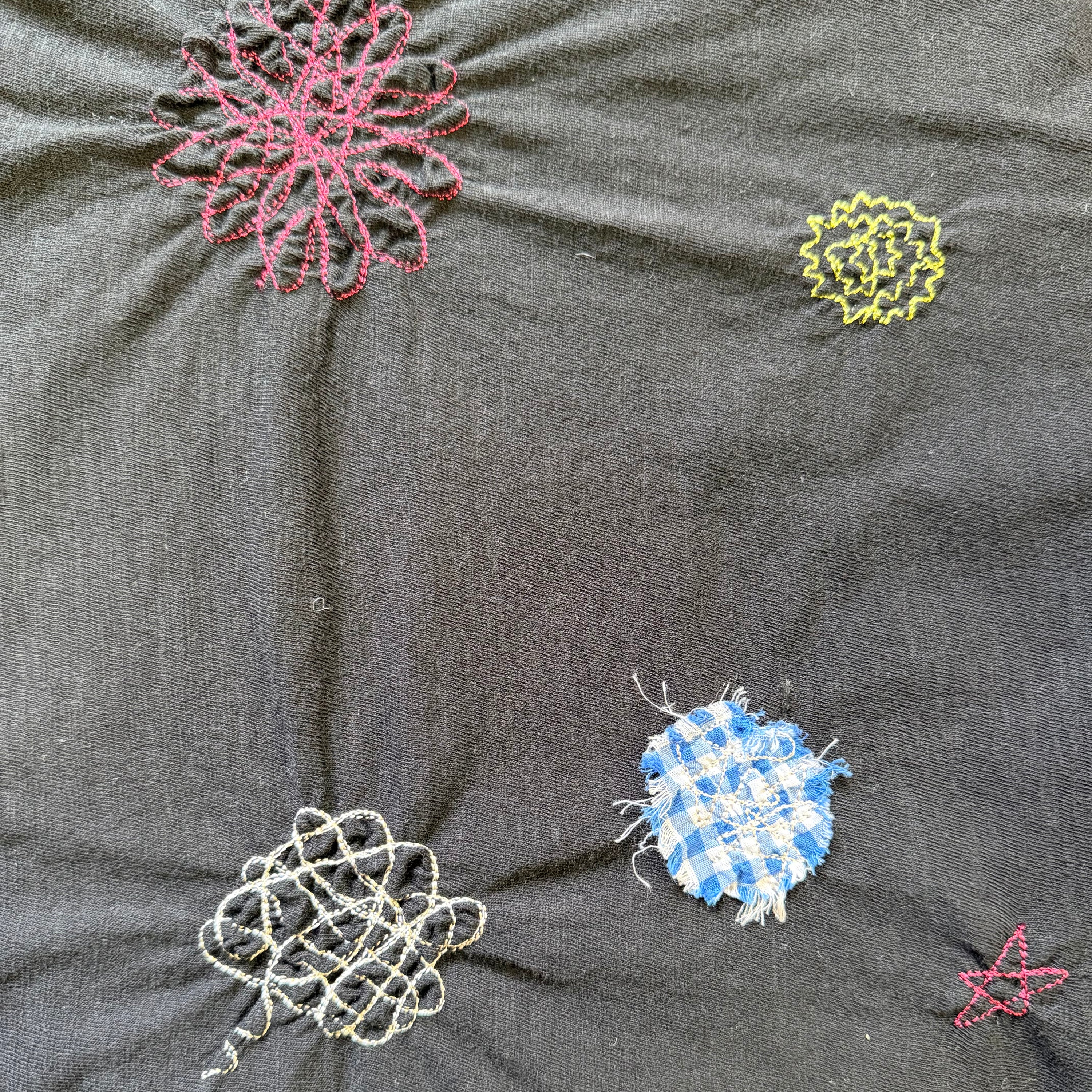 Appliqued no sleeves top