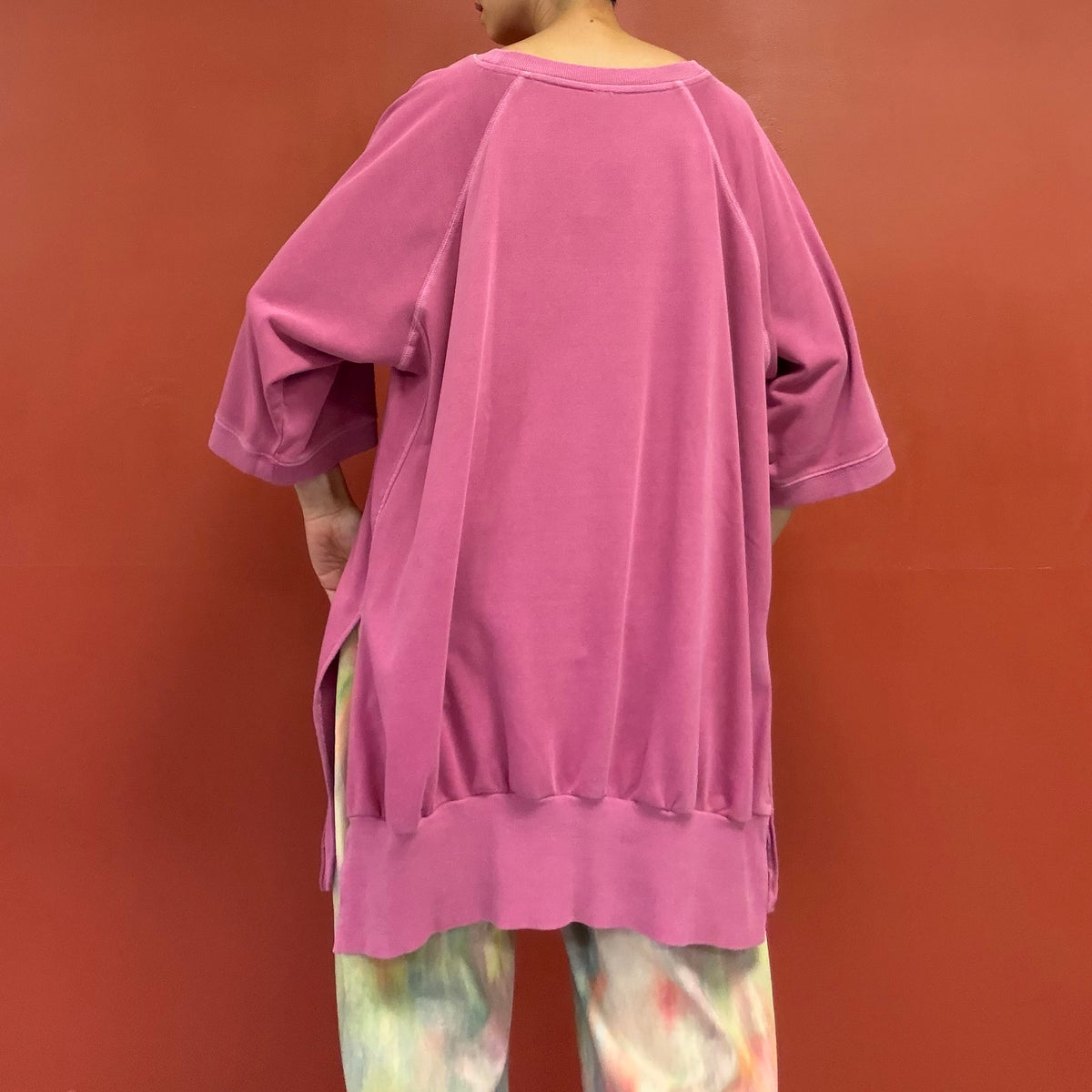Asymmetrical draped tunic top